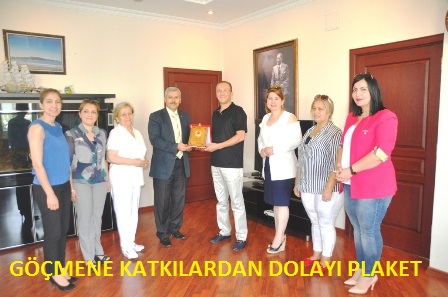 İŞADAMI ZEKİ GÖÇMENE PLAKET